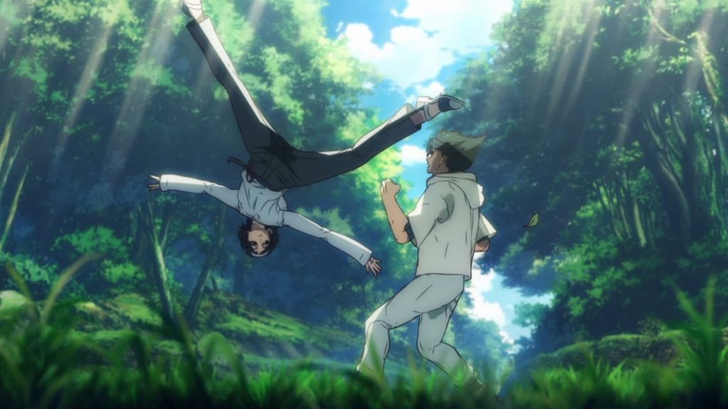 Jin et Jun Kazama s’entraînent dans la forêt de Yakushima lors du 1er épisode de Tekken: Bloodline, sous les rayons du soleil perçant la canopée.